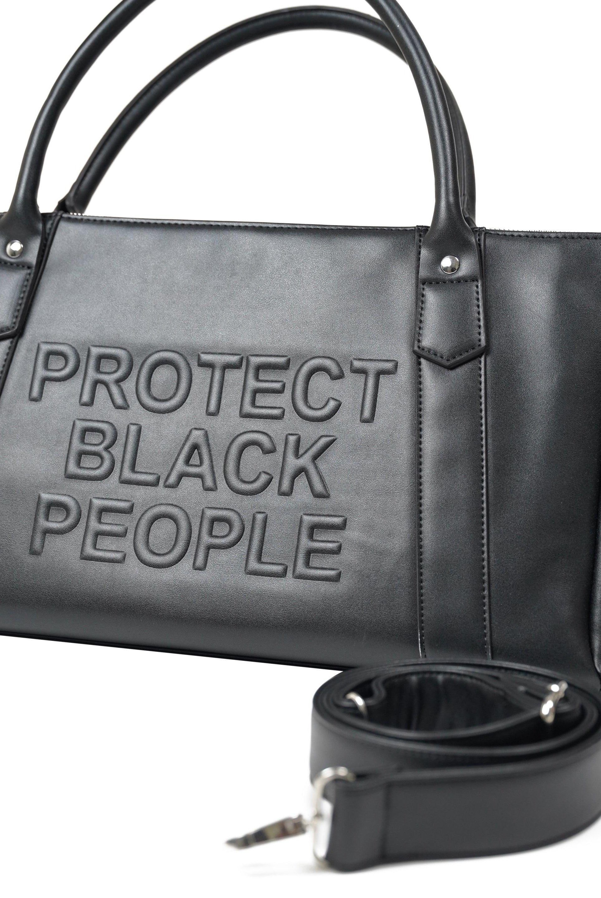 black leather duffle bag