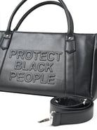 black leather duffle bag