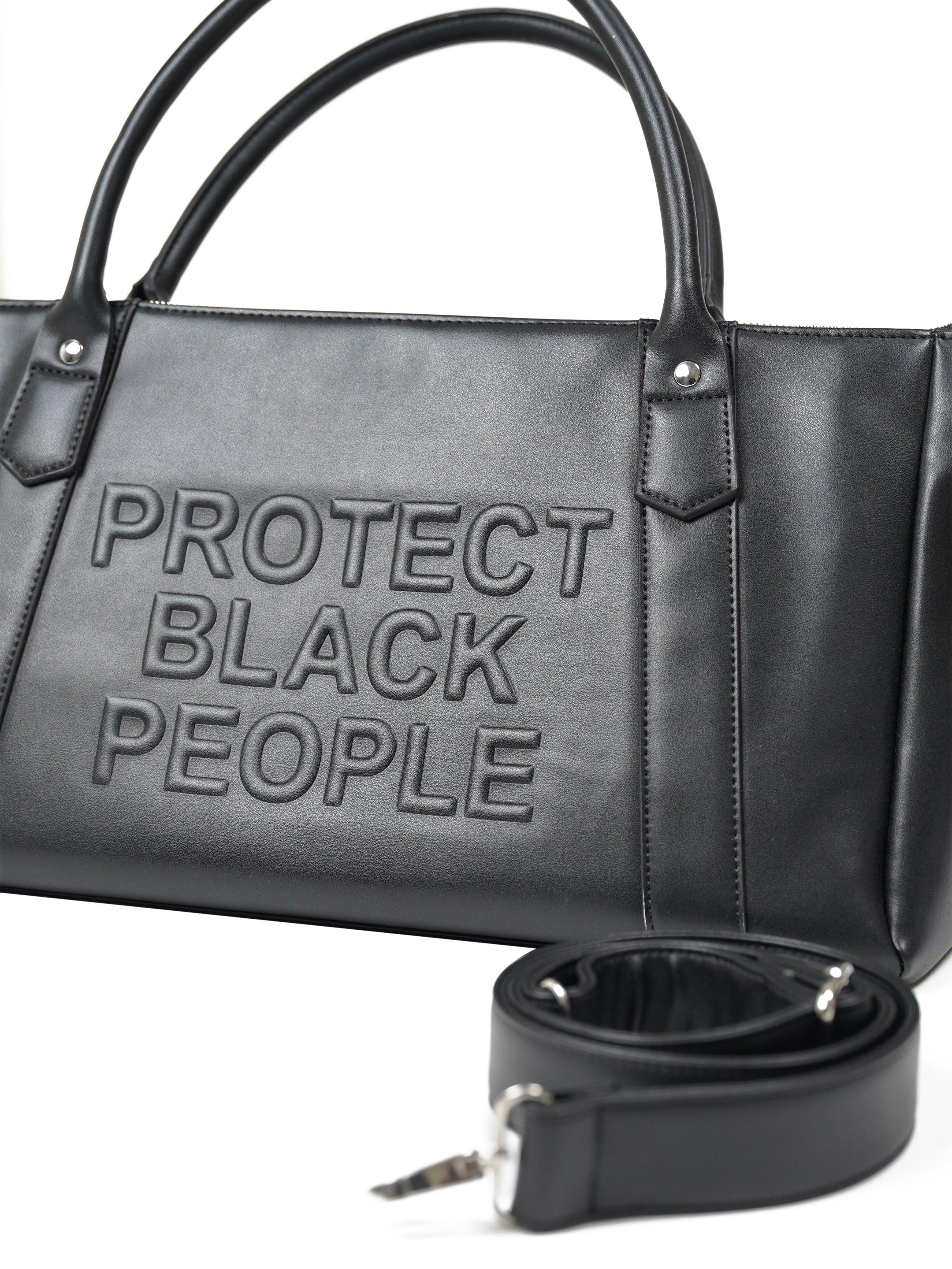 black leather duffle bag